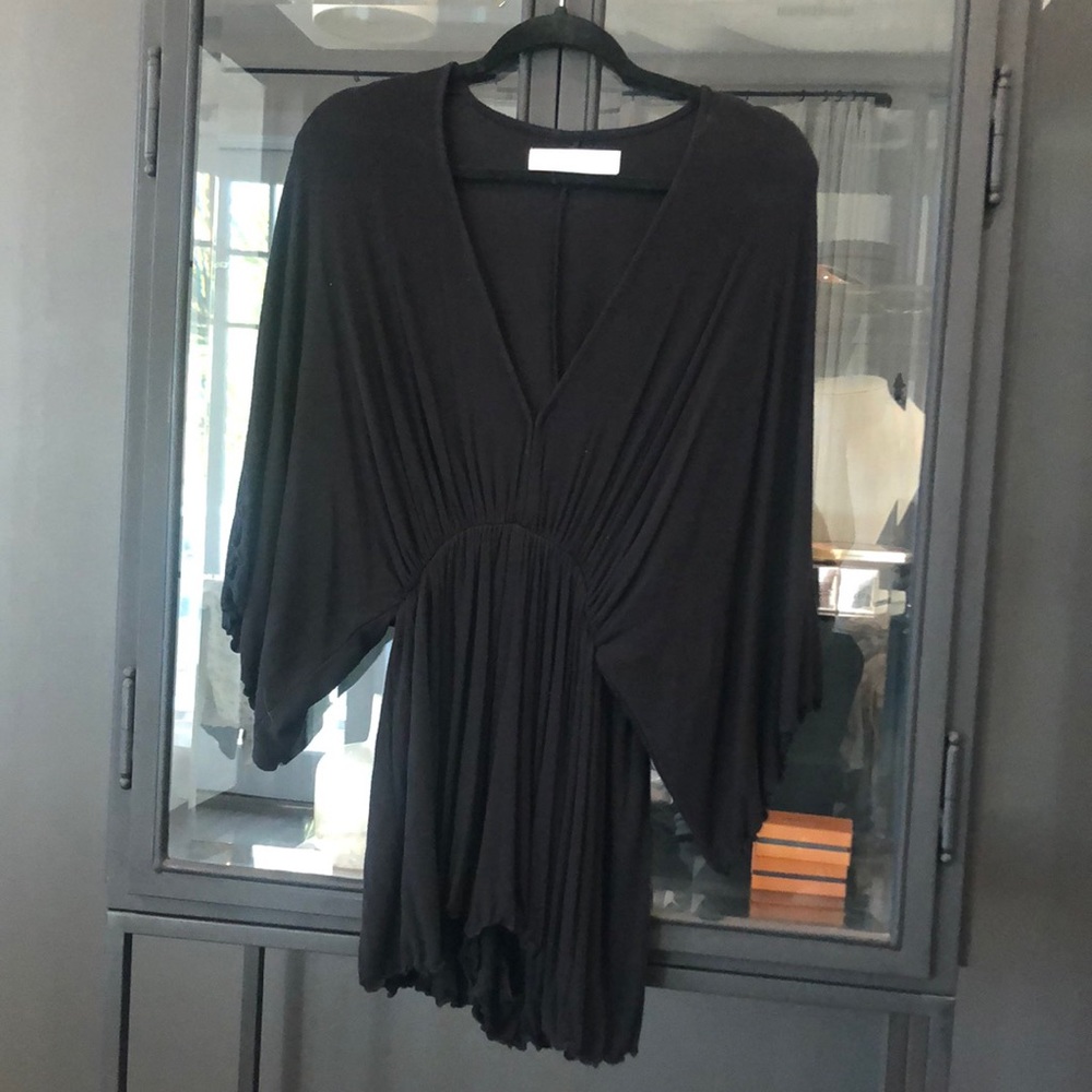 Free people beach cover up romper.